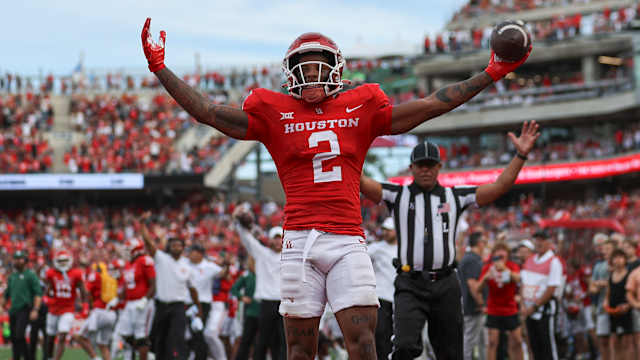 Oct 21, 2023; Houston, Texas, USA; Houston Cougars wide receiver Matthew Golden (2) celebrates after scoring a touchdown during the third quarter against the Texas Longhorns at TDECU Stadium.